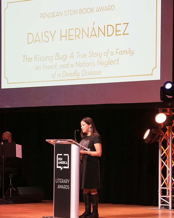 Daisy Hernandez accepts the PEN award onstage 