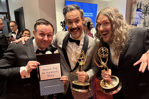 Jason C. Brown, Eric Appel, and Al Yankovic with Emmy award