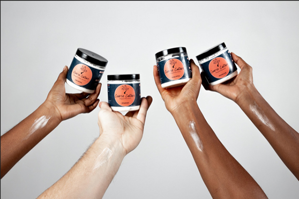 Diverse arms with Coarse Culture skin care product