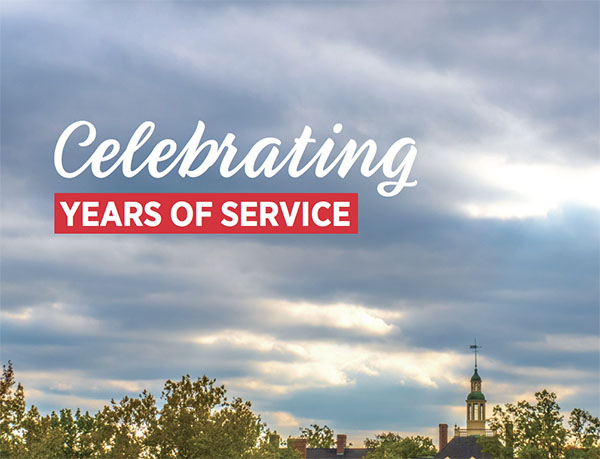 Celebrating years of service on a background of the sky over MacCracken Hall