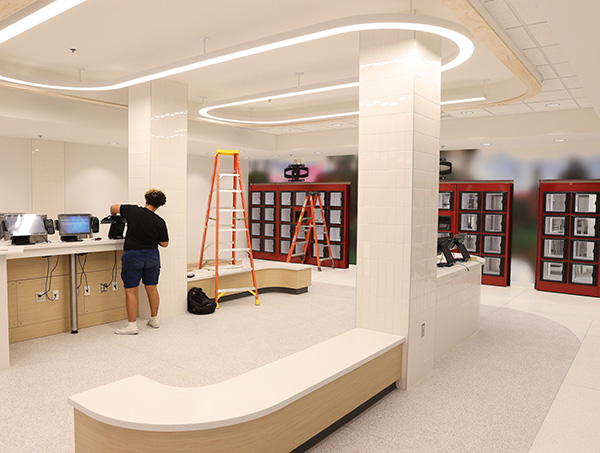 Bell Tower lobby and ordering kiosks and food lockers in background