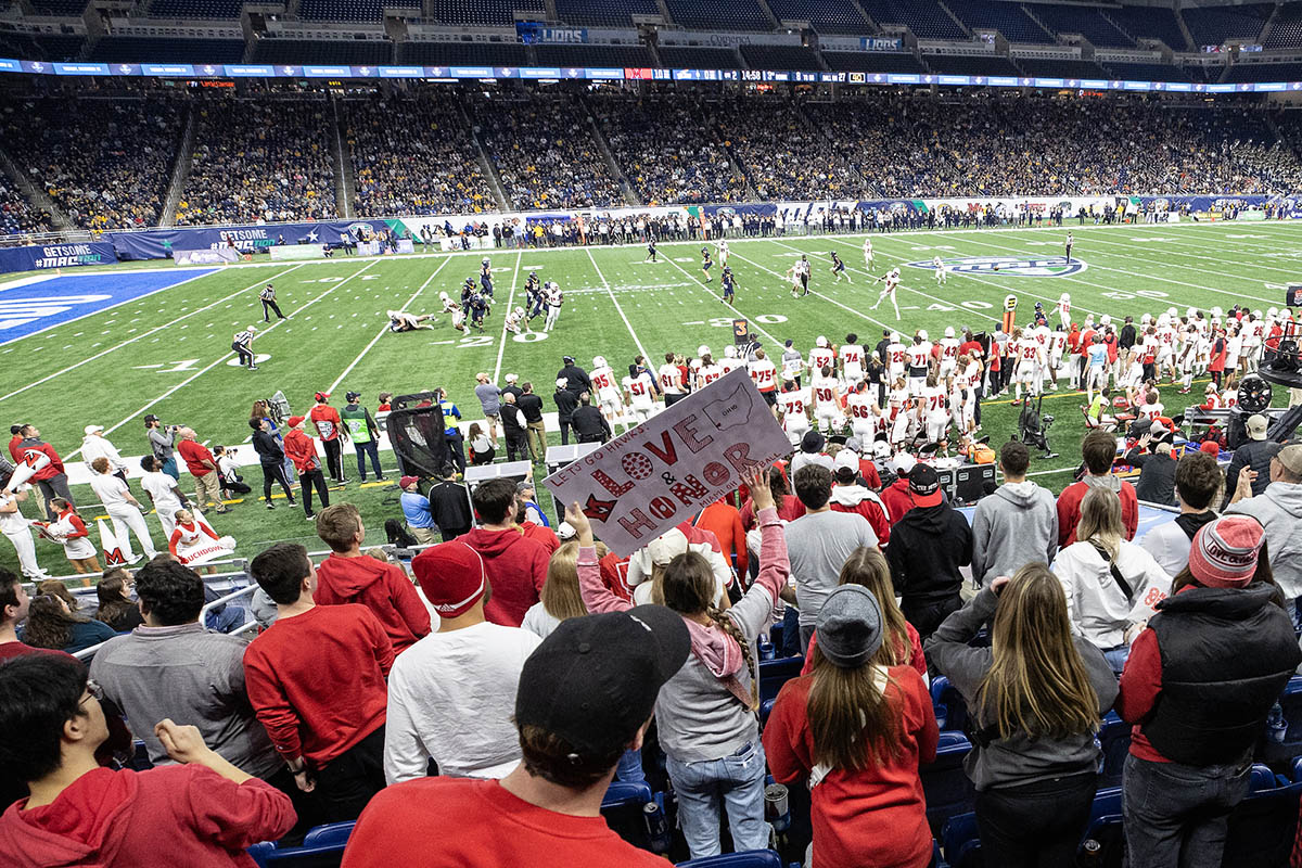 Fan holds up Love and Honor sign