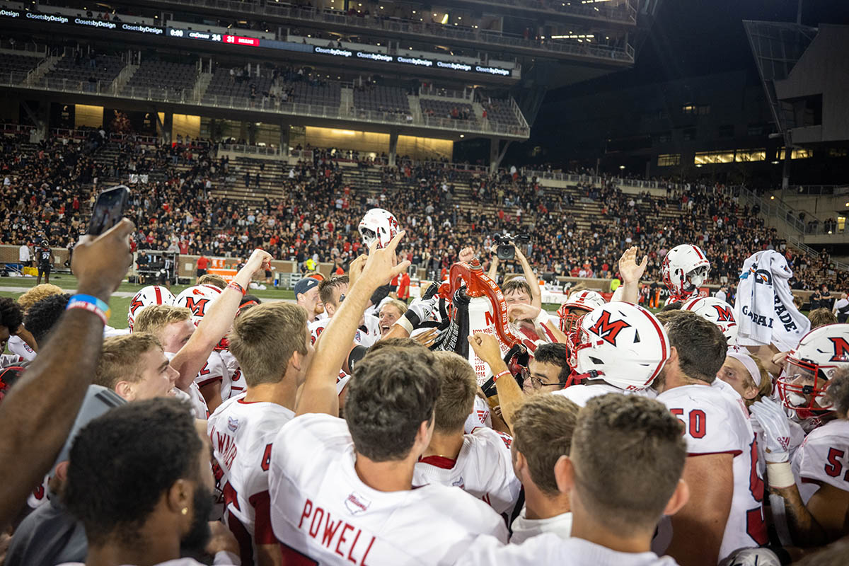 Miami celebrates a football victory at Cincinnati