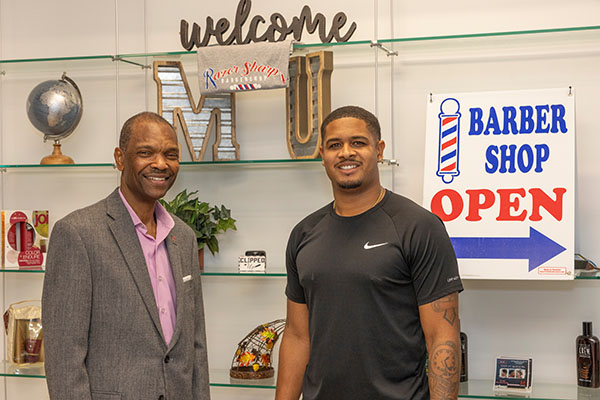 Mark Taylor and Marquan Richardson at Razor Sharp barbershop