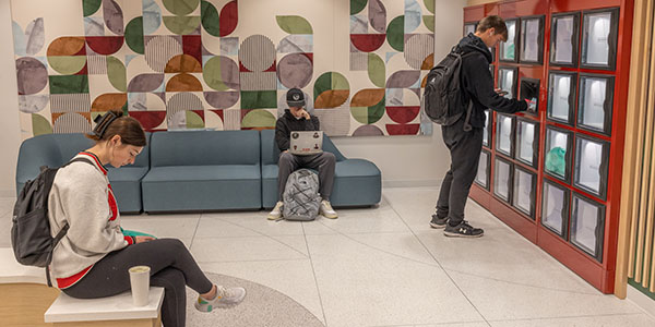 A student at a Bell Tower food locker