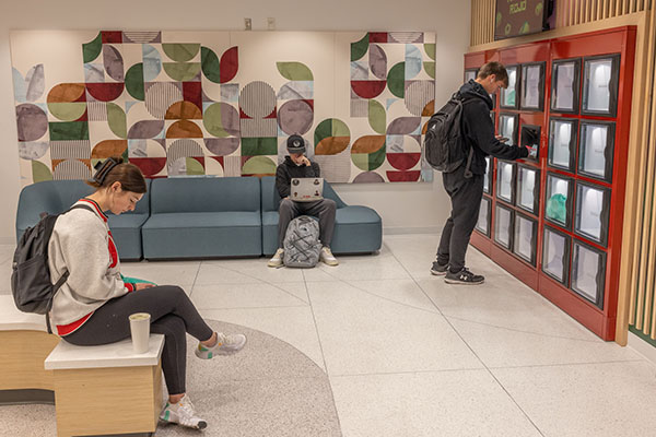 A student at a Bell Tower food locker