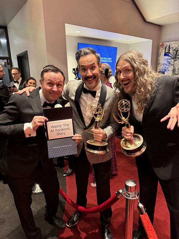 Jason C. Brown, Eric Appel, and Al Yankovic with Emmy award