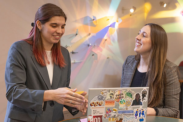 Katie Dunn, left, works in Carlyn Kimiecik’s lab to combine sport and social work to improve communities