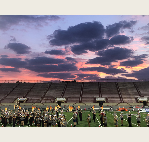 The MUMB practiced at sunrise before the RedHawks home opener Sept. 20 (photo by Tim Cary)