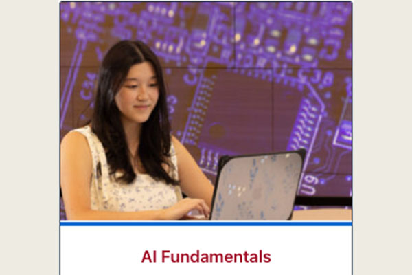 Student with computer and AI Fundamentals 