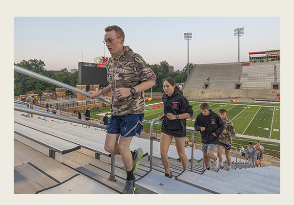 ROTC Cadets climb the steps at Yager Stadium